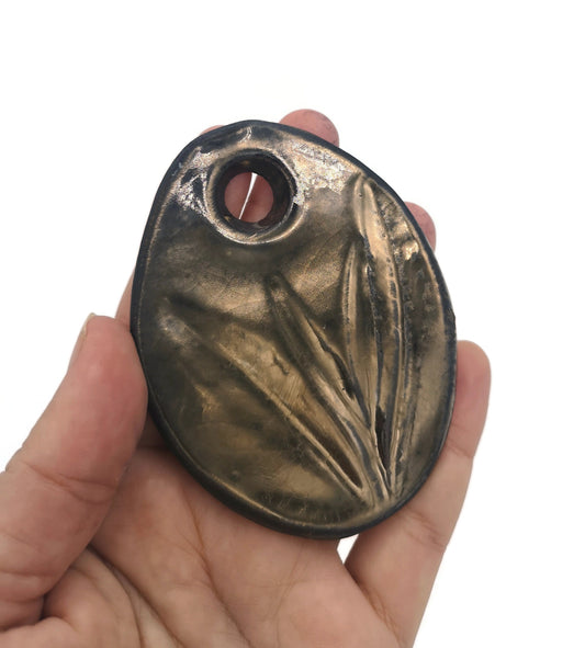 Sage ceramic leaf pendant with glazed finish