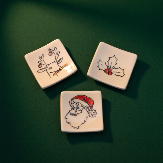 Handmade ceramic Christmas trinket dishes with Santa Holly and Reindeer designs