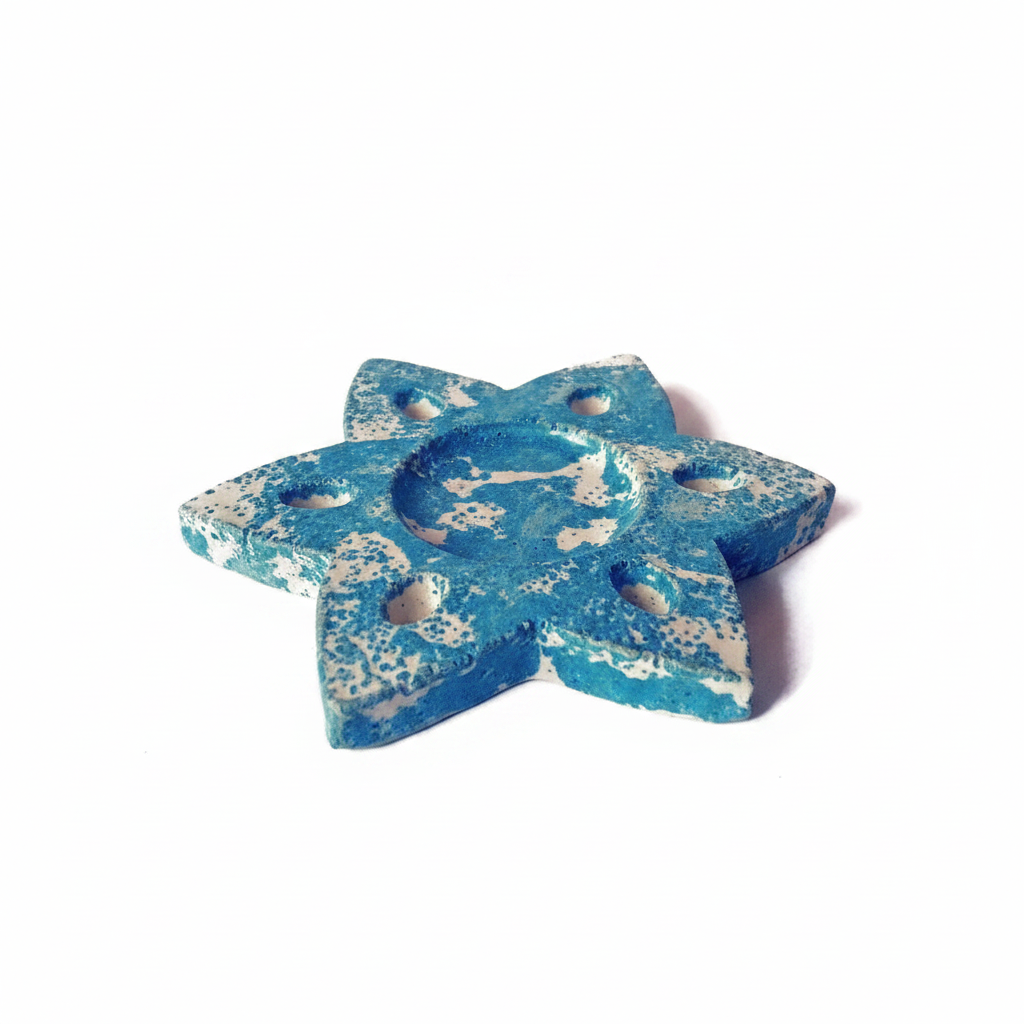 Blue handmade ceramic star candle holder
