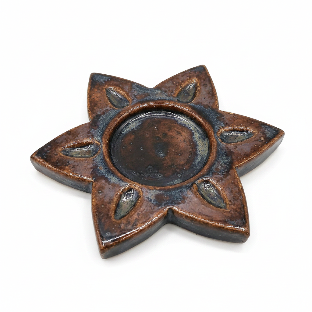 Brown handmade ceramic star candle holder