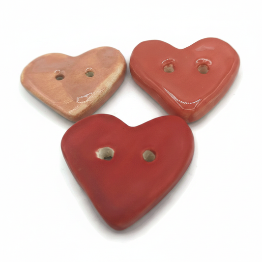 Set of three handmade ceramic heart buttons