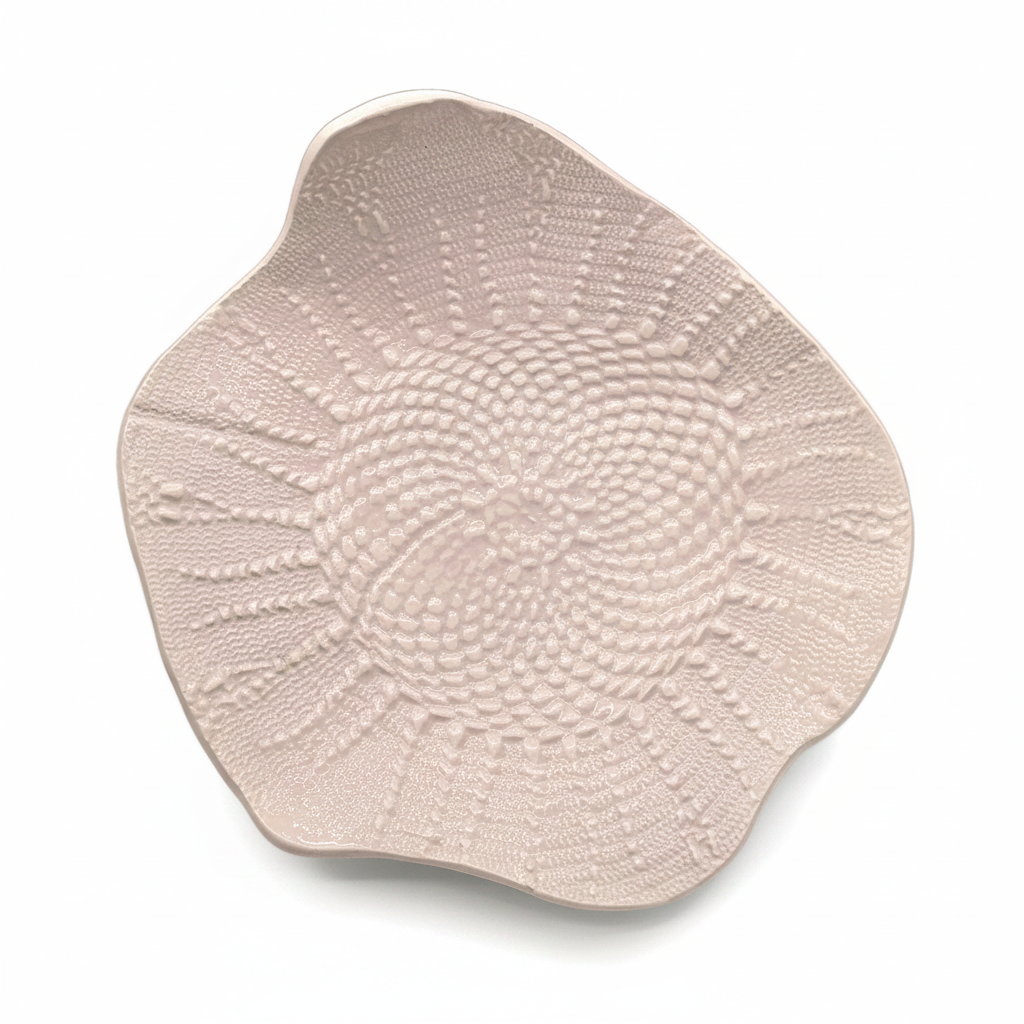 Handmade soft pink ceramic wall plate