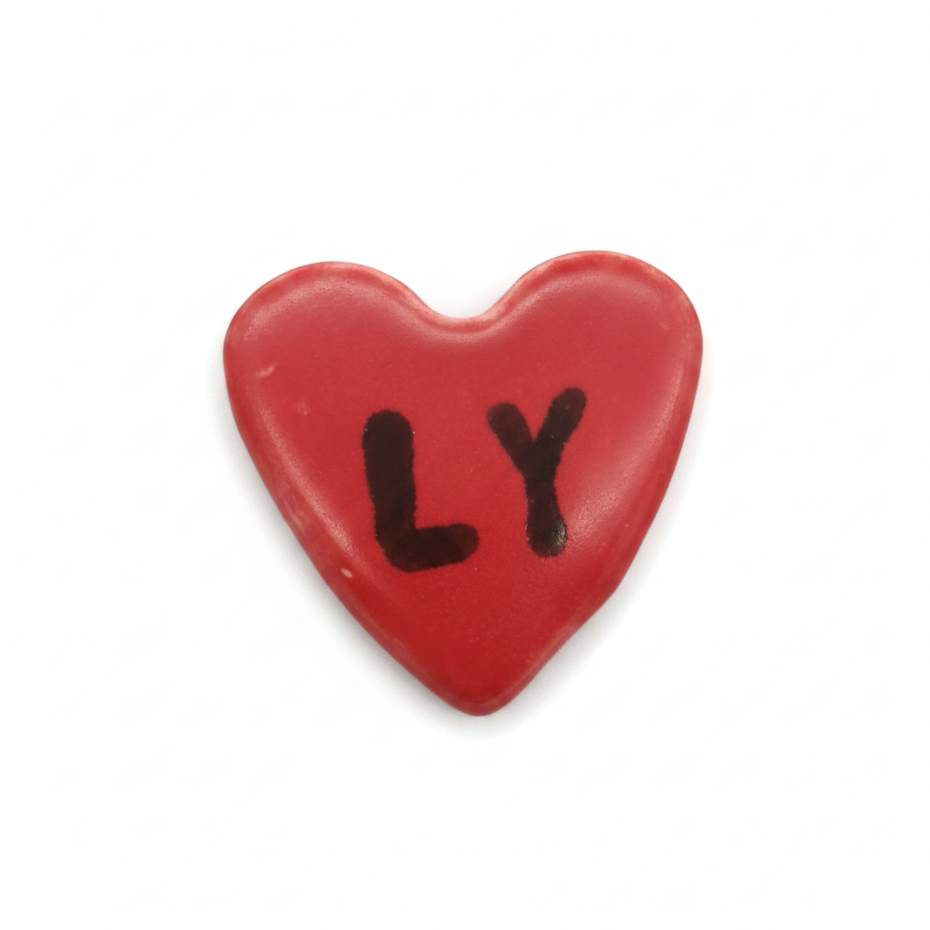 Red glazed ceramic heart lapel pin