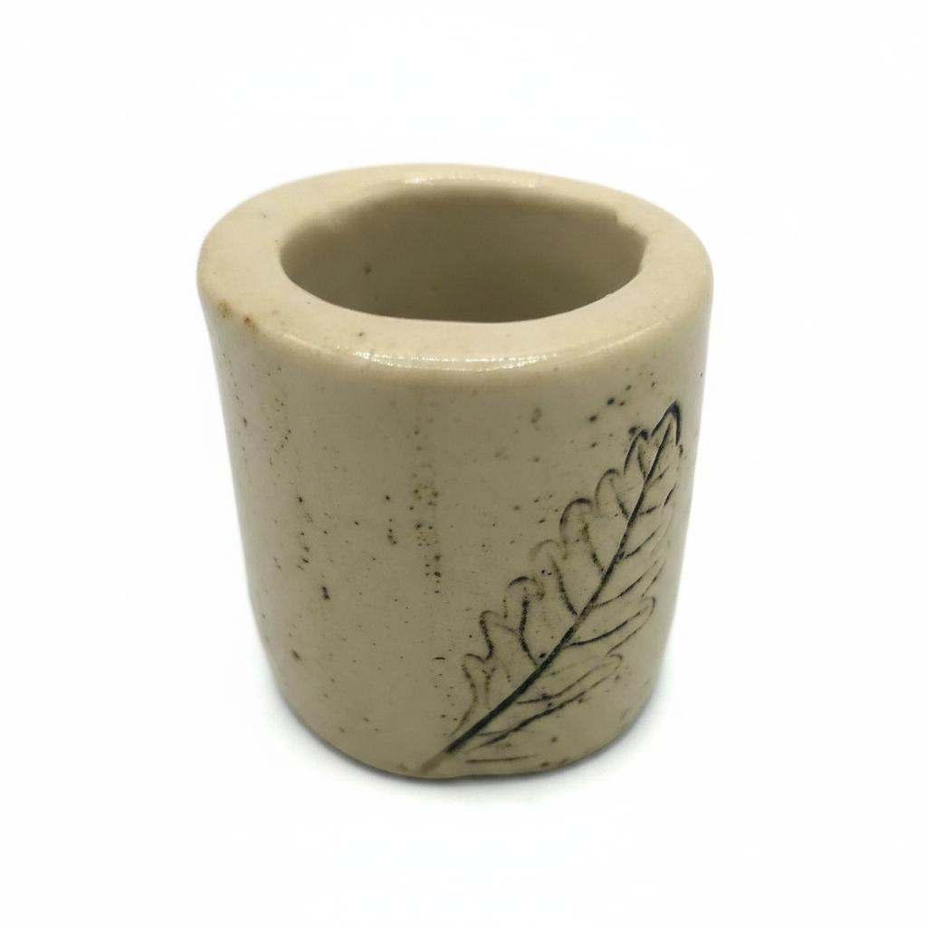 Handmade textured leaf ceramic napkin ring