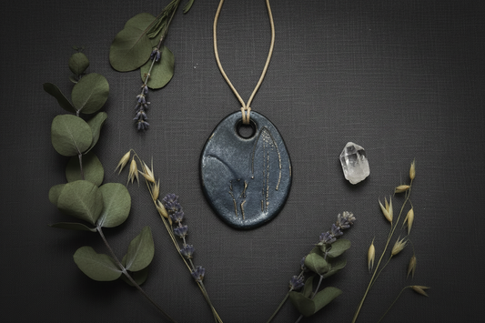 Sage ceramic leaf pendant shown without necklace chain